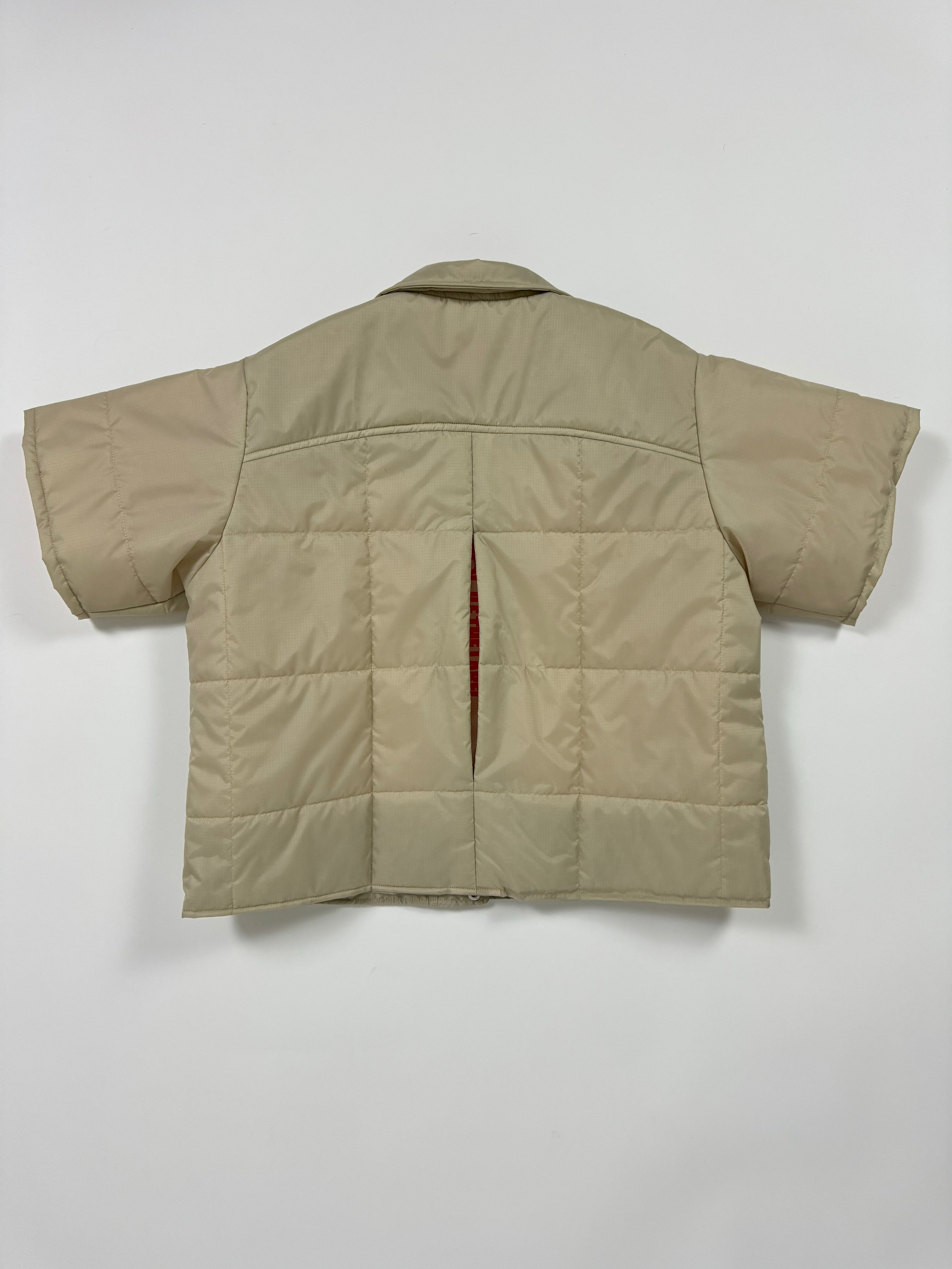 PEEK-A-BOO SHORT SLEEVE PUFFER JACKET